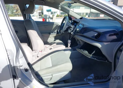 2010 Honda Insight Lx from USA, damaged, VIN JHMZE2H5XAS011239